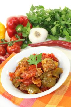 oriental vegetables pan with peppers, tomato and meatballs