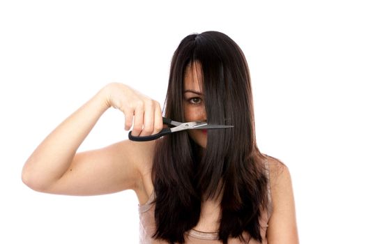 Young Woman Cutting Hair. Model Released