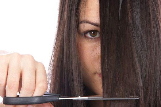 Young Woman Cutting Hair. Model Released