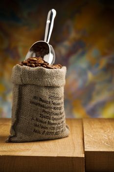 small sack fith coffee beans and scoop