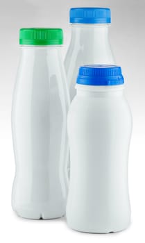 three white bottle on a white background