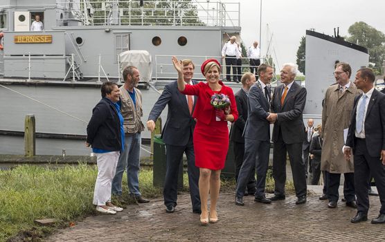 Hellevoetsluis,HOLLAND - JUNE 21:King Willem Alexander and Queen maxima showing to the dutch citizens,on June 21,2013 in Hellevoetsluis,Holland.They visit the citizins because of his coronation