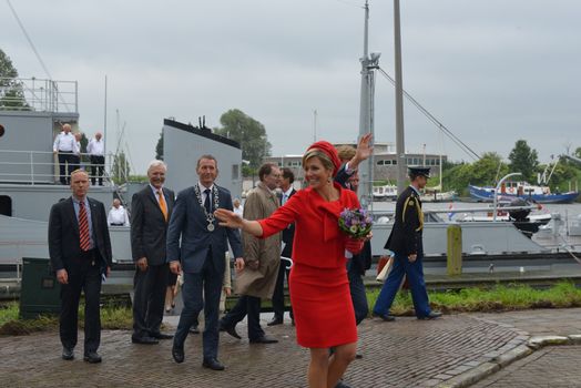 Hellevoetsluis,HOLLAND - JUNE 21:King Willem Alexander and Queen maxima showing to the dutch citizens,on June 21,2013 in Hellevoetsluis,Holland.They visit the citizins because of his coronation