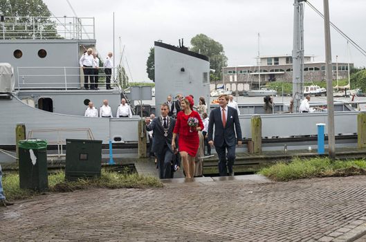Hellevoetsluis,HOLLAND - JUNE 21:King Willem Alexander and Queen maxima showing to the dutch citizens,on June 21,2013 in Hellevoetsluis,Holland.They visit the citizins because of his coronation