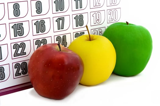 apple on background of a calendar