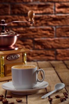 coffee composition on the background of a brickwall