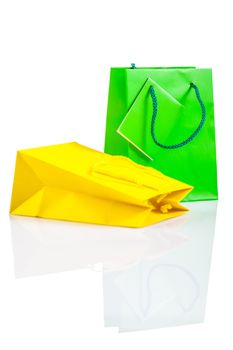 yellow and green paper bag isolated