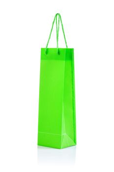a green paper bag isolated on white