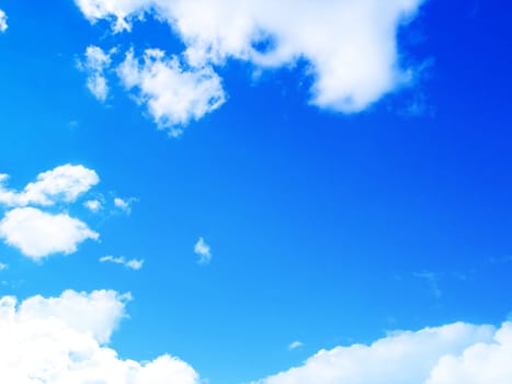 blue sky background with tiny clouds