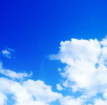 Blue sky with clouds and sun  