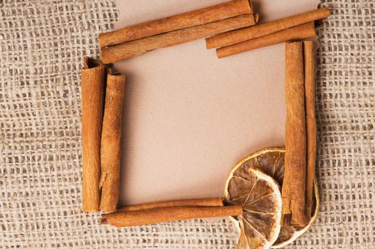 old paper for recipes and spices on burlap closeup