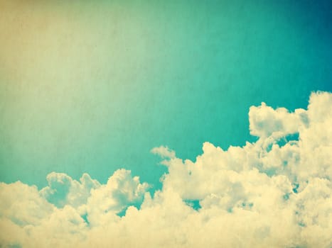 Vintage background in the blue shade with clouds