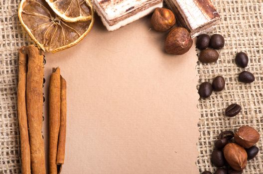 Menu Design. Old paper, coffee bean, cinnamon, lemon, burlap.