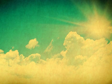 Vintage background in the blue shade with clouds