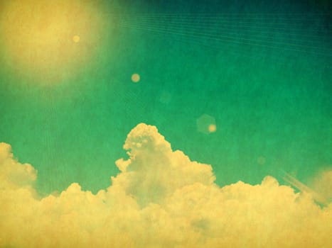 Vintage background in the blue shade with clouds