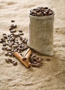 coffee grains in bag with cinnamon