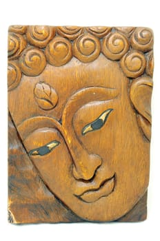 Wooden carving Buddha portrait souvenir of Thailand