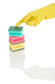 hand with colored sponges