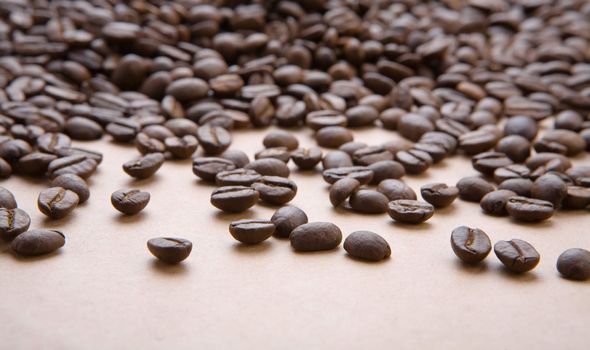 background of coffee grains on a paper 