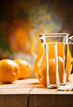 emrty glassware and oranges
