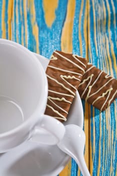 empty coffee cup and cookie