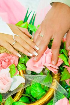 hand on wedding bouquet