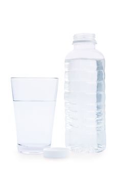composition of bottle and glass  with water