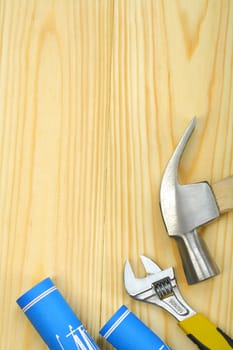 copyspace image of hammer spanner and blueprints