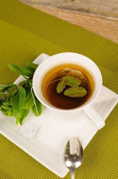 Aromatic tea scented with freshly picked mint leaves