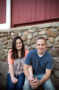 Young happy couple enjoying each others company outdoors.