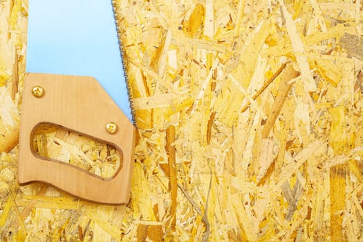 handsaw on plywood