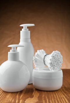 bottles and jar with pads