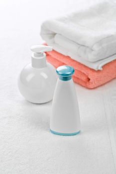 bottles with two towels