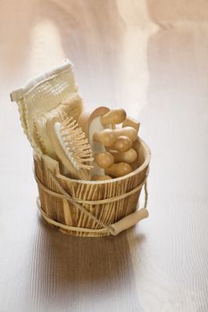 bucket with massager hairbrush and bast