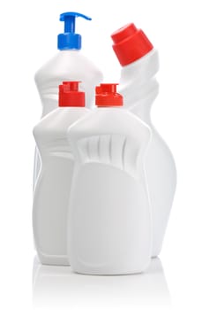 four bottles with colored covers