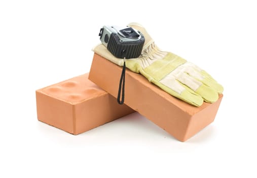 glove and tapeline on bricks