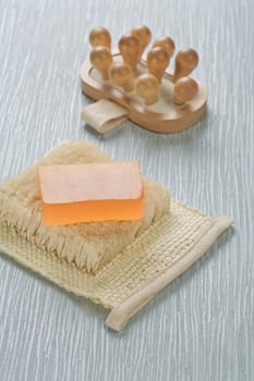 massager and soap on bast