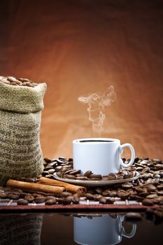 cup and sack with beans