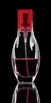 perfume bottle on black background