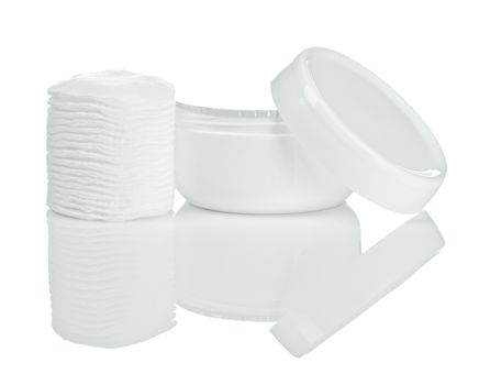 cotton pads and cream isolated with reflection