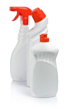 white bottles with red covers