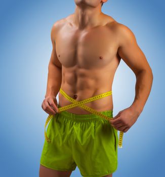 male torso with measure tape