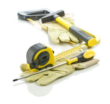 gloves with stack of tools