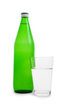 green bottle and glass with water