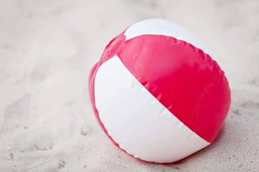 beach ball in sand on the beach summertime holiday vacation fun