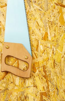 handsaw on plywood