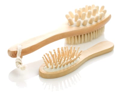 isolated hairbrush and massager