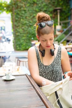 beautiful stylish modern young woman in the city