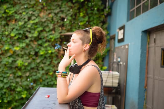 beautiful stylish modern young woman in the city