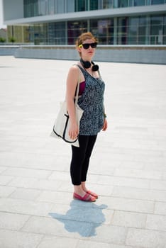 beautiful stylish modern young woman in the city